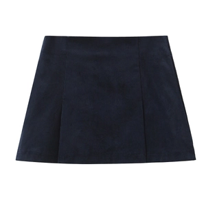 Flat lay of navy blue corduroy mini skirt showing rich ribbed texture and A-line cut
