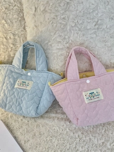 Quilted mini heart pattern tote bag in light pink and blue colors for daily commute