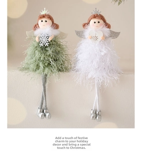 Close-up of angel Christmas dolls with feather skirts and silver boots for tree decor