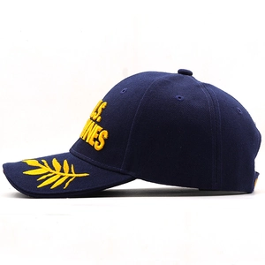 Detail of navy baseball cap featuring yellow U.S. MARINES 3D embroidery and leaf design