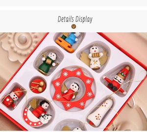 Macro detail of hand-painted wooden Christmas ornaments in a red gift box display