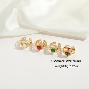Minimalist adjustable gold resin rings with white, red, green, and brown gemstones