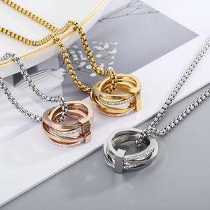 Hip hop layered pearl necklace with gold, silver, and rose gold multi-ring pendants