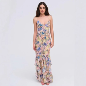 Floral print sleeveless maxi dress with V-neckline and layered ruffle hem for summer