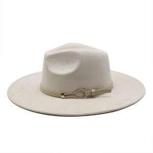 Detail of faux suede fedora hat with thin leather band and golden buckle accent