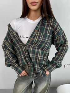 Women's dark green plaid flannel shirt with front pocket and retro wash denim jeans