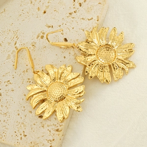 Golden sunflower earrings with textured petals and long hook hangers on stone base