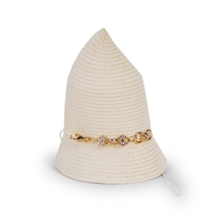 Close-up of beige straw sun hat featuring a gold floral metal chain detail and texture