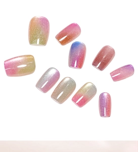 Detailed view of 10pcs rainbow cat eye press-on nails with holographic shimmer finish