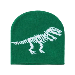 Detailed knit texture of a green beanie featuring a white dinosaur skeleton pattern