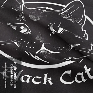 Detailed close-up of high-quality black fabric with a precise white cat print texture