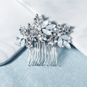 Elegant bridal hair comb with blue rhinestones and white pearls on silver metal base