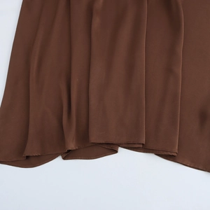 Elegant V-neck chiffon maxi dress in deep brown with long sleeves and pleated hem detail