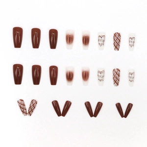 Brown plaid and heart Christmas press-on nails with Merry Christmas graffiti art