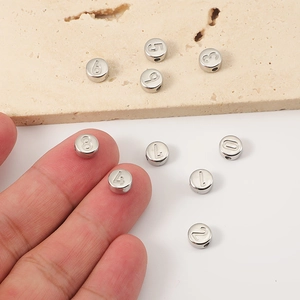 Ronde roestvrijstalen kralen met cijfers 0-9 voor DIY sieraden en halskettingen