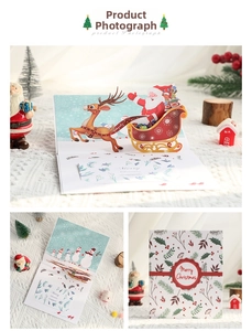 Dettaglio biglietto di auguri 3D con Babbo Natale sulla slitta e foresta innevata