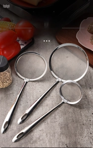 Set of three stainless steel fine mesh oil skimmers in small medium and large sizes