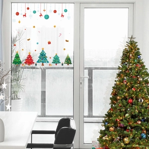 Christmas window decals with tree and reindeer patterns on glass door for festive party decor