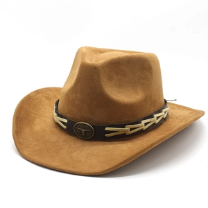 Brown faux suede western cowboy hat featuring a vintage bull head buckle and leather band