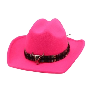 Vibrant pink western cowboy hat with ethnic braided band and retro bull skull emblem