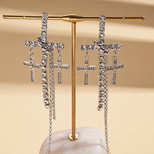 Sparkling crystal cross tassel drop earrings in silver finish for a gothic look