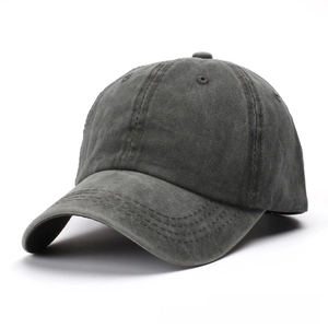 Detail of gray washed canvas baseball cap showing vintage texture and stitching
