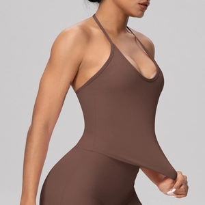Detailed view of high-elasticity fabric stretch on brown yoga tank top for women