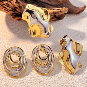 Modern 18K gold plated stainless steel jewelry set with abstract wavy spiral design
