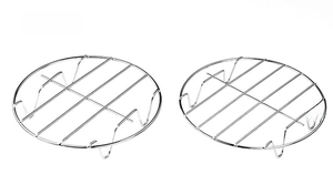 Detail of two stainless steel steaming racks with parallel grates and support feet