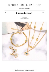Detail of titanium steel jewelry set featuring evil eye pendant with blue crystals
