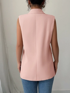 Back view of elegant pink sleeveless blazer vest showing the tailored fit and clean cut