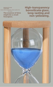 Detail of blue sand flowing through high borosilicate glass with bamboo wood frame