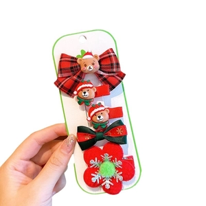 5-piece Christmas hair clip set featuring snowman, bow, and bear for girls and toddlers