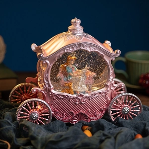 Pink princess carriage music box with magical rotating crystal ball and glitter