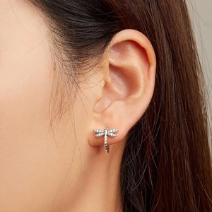 Elegant S925 sterling silver dragonfly earrings featuring clear crystal wings on model