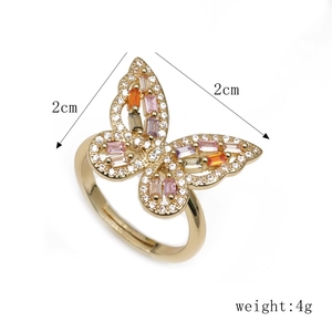 Detail view of butterfly ring with multi-color zircon stones and 2cm size specifications