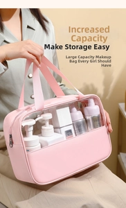 Pink waterproof travel toiletry bag with PVC window showing large storage capacity