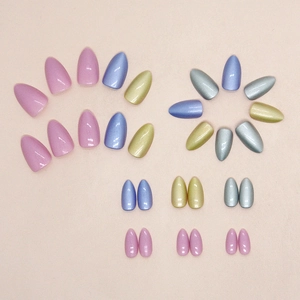 Short almond press-on nails set with aurora pearl and cat eye finish in multiple colors