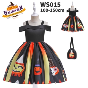 Detail of girls pumpkin witch costume set with off-shoulder dress and matching handbag