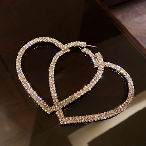 Elegant gold-tone heart-shaped hoop earrings with sparkling rhinestones for women