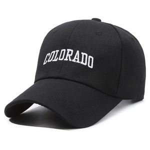 Classic black cotton baseball cap with white COLORADO embroidery on a white background