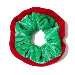 Two-tone velvet scrunchie in festive red and green colors for women hair styling