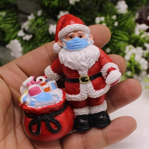 Figurine de Père Noël créative en résine avec masque et sac de protection pour Noël