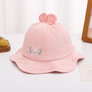 Detail of pink baby sun hat featuring 3D rabbit ears and delicate floral bunny embroidery