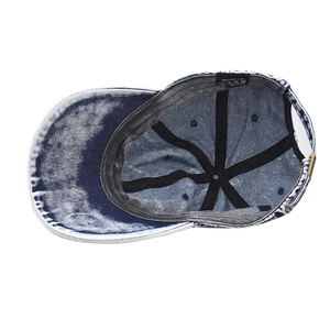 Inside view of vintage washed denim baseball cap with six-panel design and metal buckle