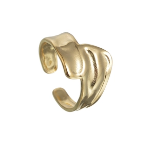 Detailed close-up of golden wavy adjustable ring with irregular ripple texture on white background