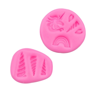 Stampi in silicone rosa per fondant con teste di unicorno, arcobaleni e corna a spirale