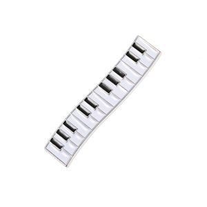 Minimalist piano key hair clip with classic black and white enamel finish on metal base