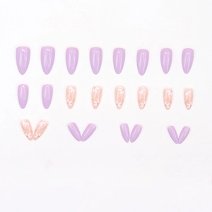 Taro purple press-on nails set in almond shape featuring white flower and gold patterns