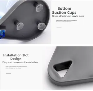 Detail of the gray leaf soap holder showing the bottom suction cups and mounting structure